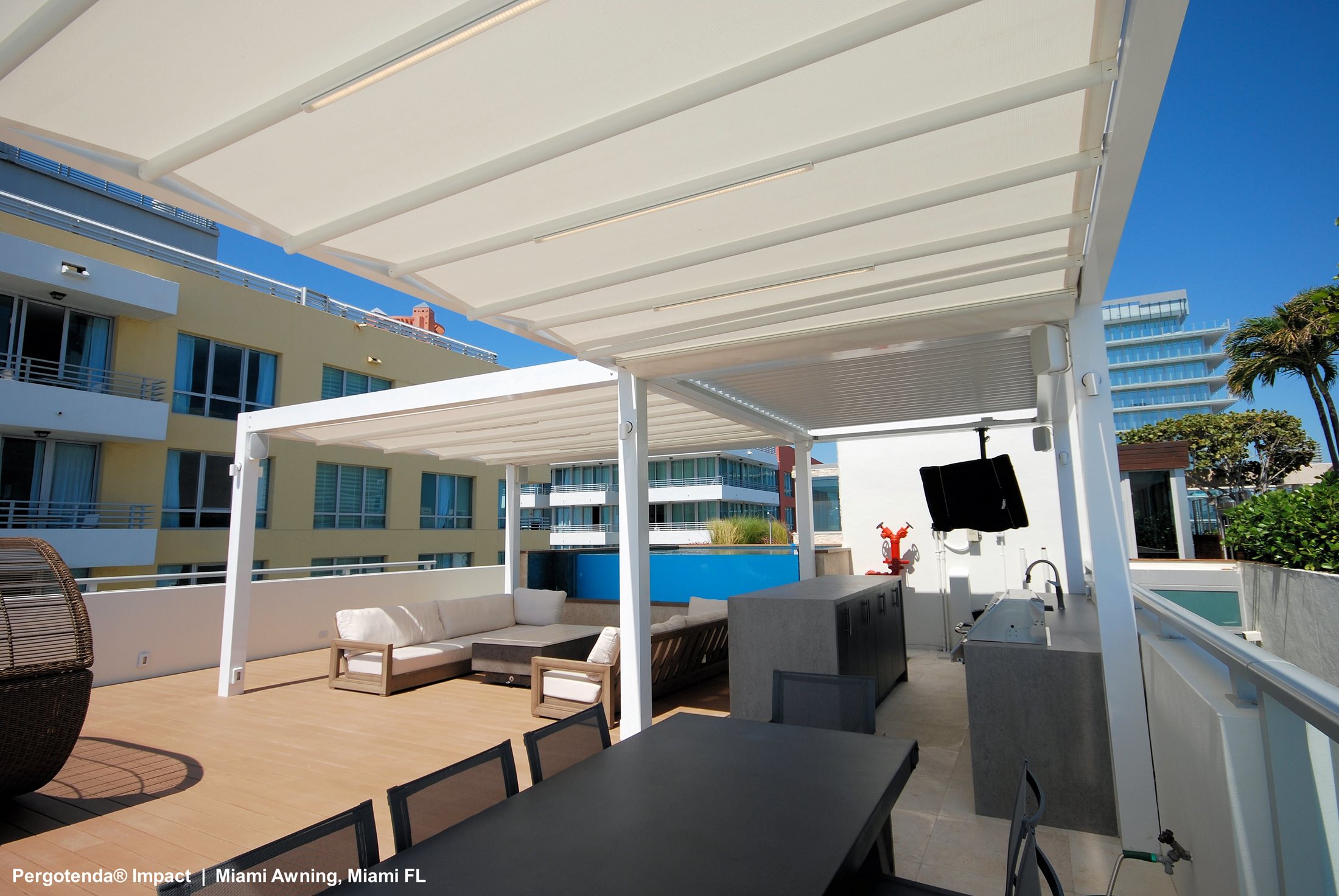Residence-with-two-Corradi-Shade-Structures-penthouse-area-by-Miami-Awning-Co-(3).jpg
